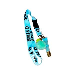 PINK light blue keychain.